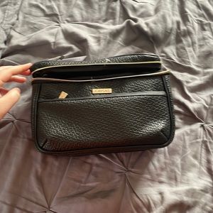 John and David, black and gold makeup bag